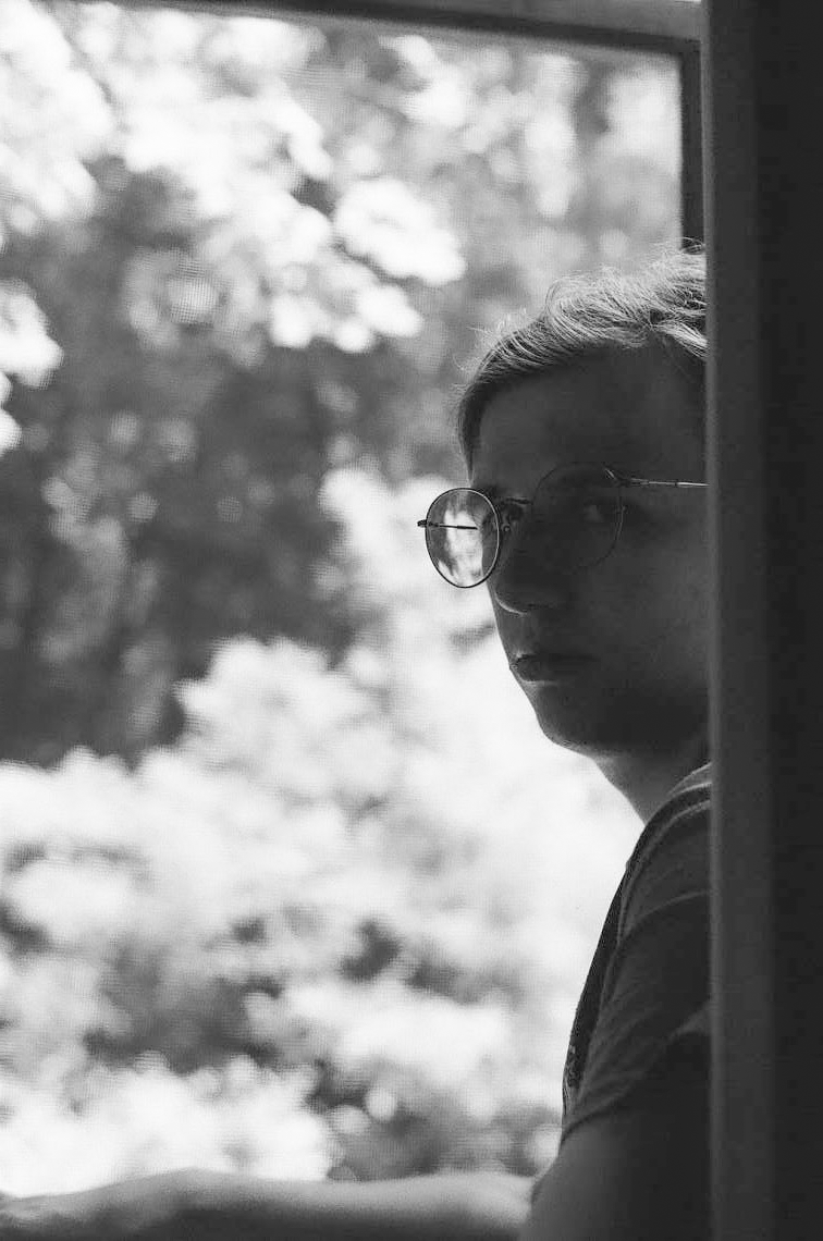A picture of Logan Brandt in black and white